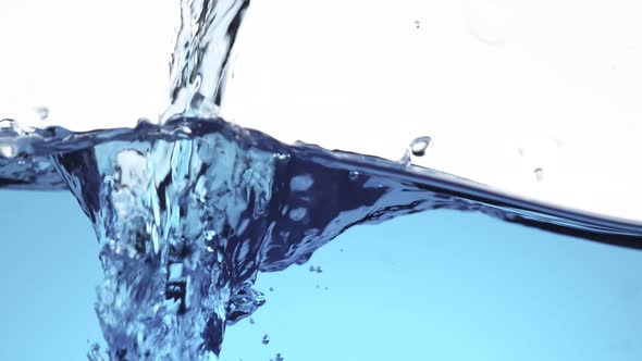 Super Slow Motion Shot of Pouring and Splashing Water at 1000 Fps alt