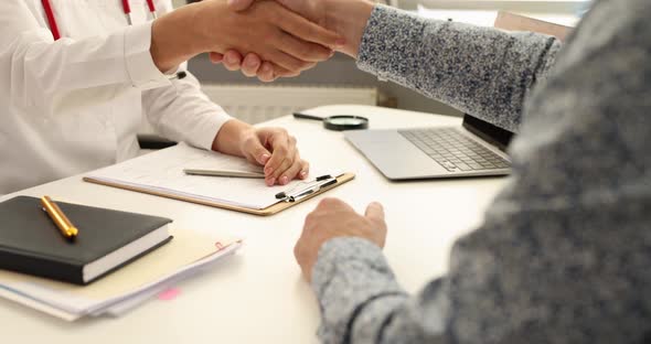 Doctor and Patient Shake Hands in Office in Clinic  Movie