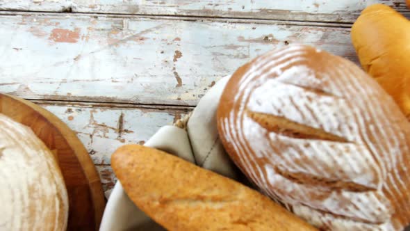 Various types of breads with wheat grains