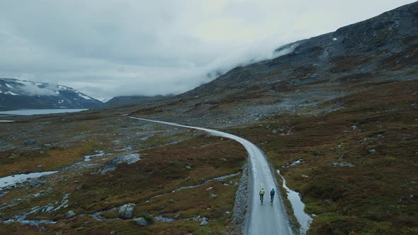 Epic Flying Drone Shot of Young Cyclists Riding