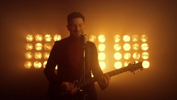 Musician Man Performing Solo on Stage Night Club