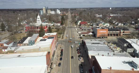 Downtown Charlotte, Michigan skyline with drone flying forward.