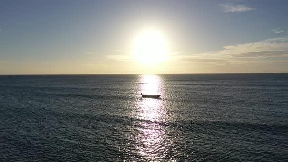 Famous sunset on sea at Jericoacoara National Park Ceara Brazil.