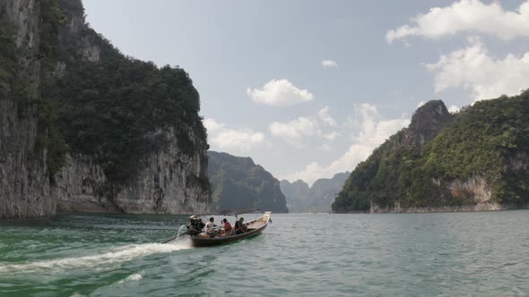 Sailing Boat at the National Park Lake Camera Follows the Thai Boat