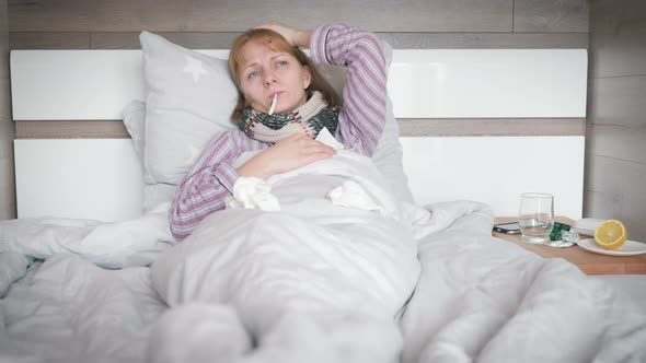 Sick Woman in Bed