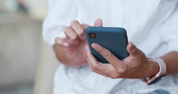 Close up of woman using smart phone