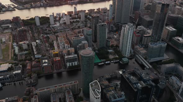 High Angle View of Water Channel Between Buildings at Canary Wharf Business District