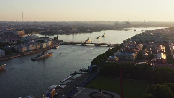 Aerial Morning Cityscape with Warships in the Waters of the Neva River Before the Holiday of the