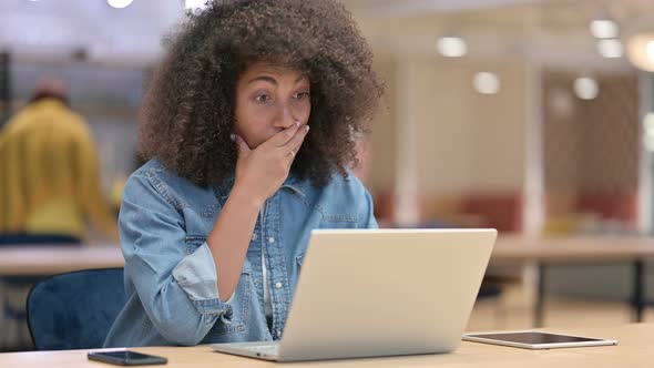 Loss, African Woman Reacting To Failure on Laptop at Work 