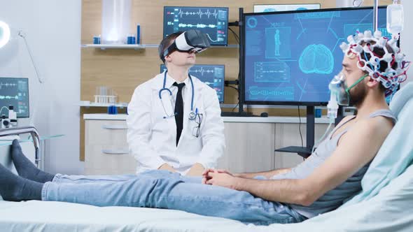 Doctor Wearing Virtual Reality Goggles in a Modern Facility for Brain Analysis