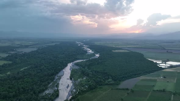 Flying over Alazani river at sunset. Kvareli, Georgia 2022 summer