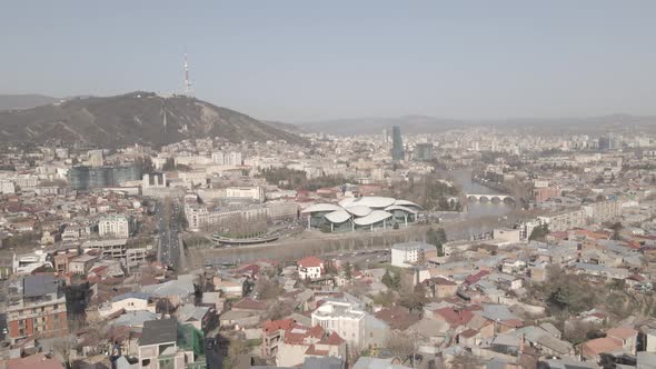 Tbilisi, Georgia - October 25 2021: Flying over Baratashvili bridge in the center of Tbilisi