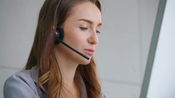 Business People Wearing Headset Working in Office