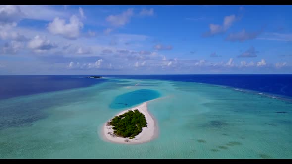 Aerial drone view scenery of perfect tourist beach vacation by blue ocean with white sand background