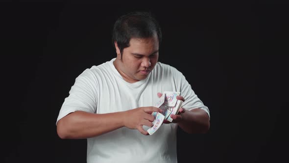 Asian Man Starts Showing His Trick With Cards