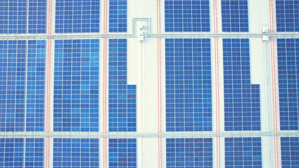 Drone flying over photovoltaic solar panels