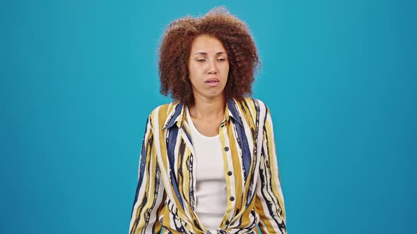 African American Woman Feels Bewildered Getting Irritated