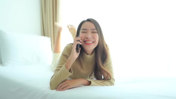 Young asian woman use smart phone