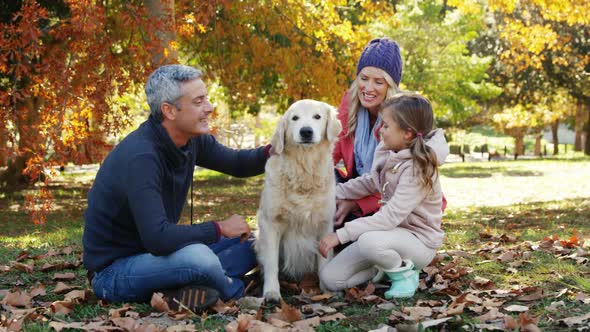 family with dog outdoors