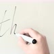 Hand writing the word "THANKS" on white blackboard - VideoHive Item for Sale