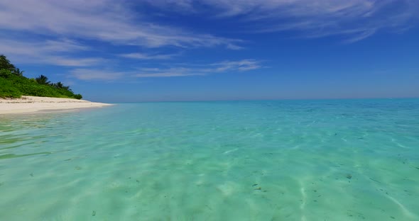 Luxury above island view of a summer white paradise sand beach and aqua blue ocean background in vibrant