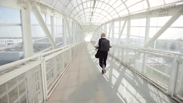 SLOW MOTION: Late Businessman Is Running To a Meeting