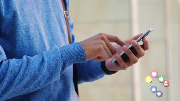 Man in a sweater is checking his phone 4k