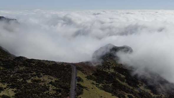 Empty road and low clouds in the background, Madeira, Portugal