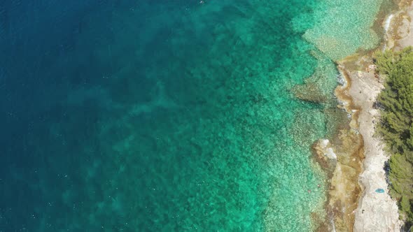 Aerial View of Rocky Coast of the Adriatic Sea with Crystal Clear Waters