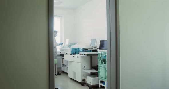 A Team of Laboratory Technicians Work in a Modern Wellequipped Laboratory