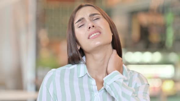 Portrait of Sleepy Young Latin Woman Yawning Drowsy