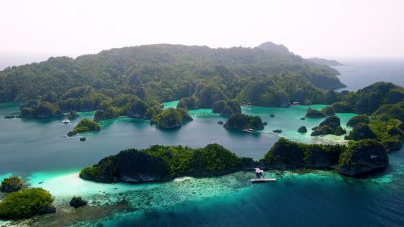 Piaynemo islands in Raja Ampat area Indonesia, Aerial dolly out reveal shot