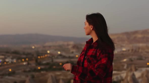 Girl Traveler Watching Sunset From The Viewing Place. Portrait