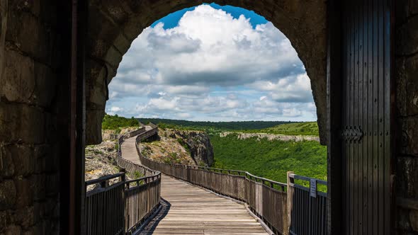 Time lapse with moving clouds over the medieval fortress