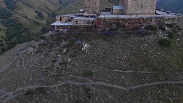 Aerial View At The Gergeti Trinity Church Tsminda Sameba