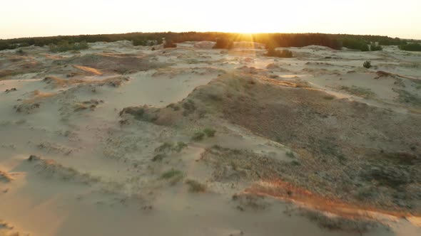 Sunset Over the Sand Dunes in the Desert