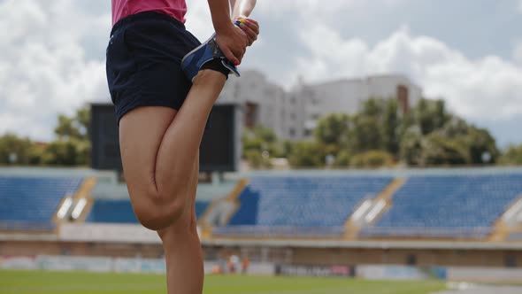 Girl Runner Warm-up Before Running, Close-up