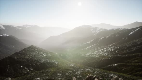 Mountains in Fog at Sunset