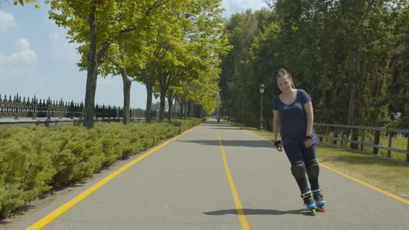 Happy Female Roller Enjoying Freeride Outdoors