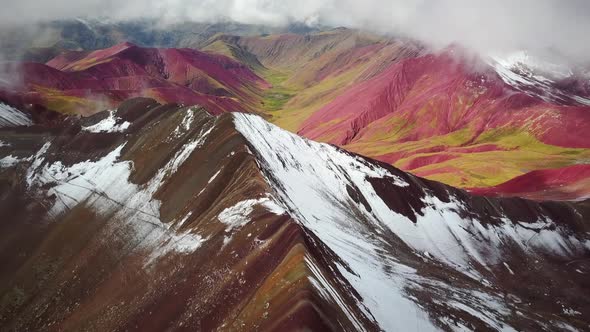 Aerial panoramic view of  colourful Vinicunca, Rainbow Mountain, Peru.