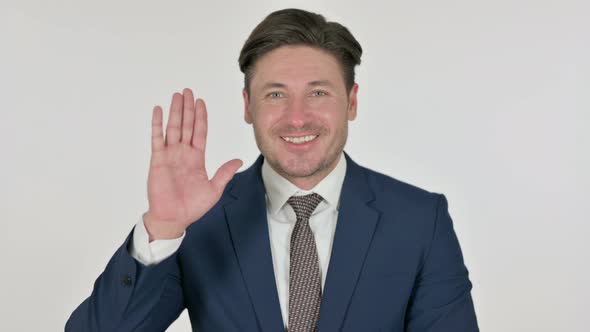 Middle Aged Businessman Waving, Welcoming, White Background