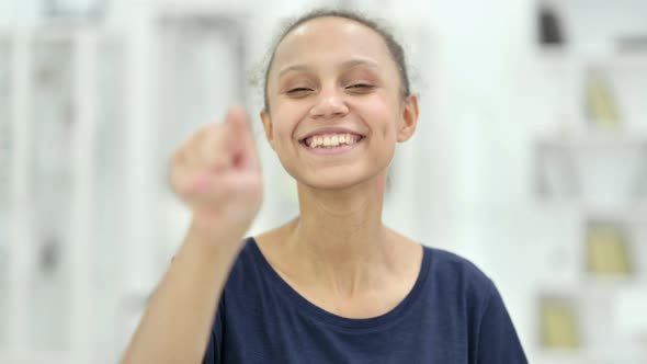 Portrait of Assertive African Woman with Pointing with Finger