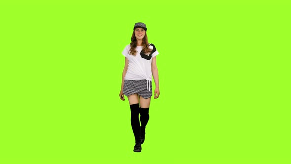Cheerful Young Woman Walking on Green Background, Chroma Key