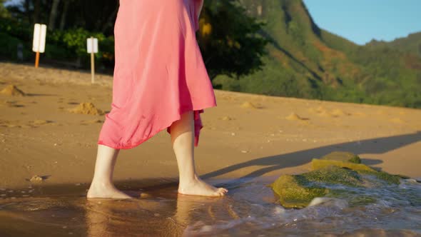 Slow Motion Woman Feet Walking Barefoot By Beach at Sunset Leaving Footprints