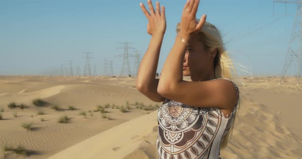 Portrait of a Young Blonde Woman in the Desert Posing Rub Al Khali Desert