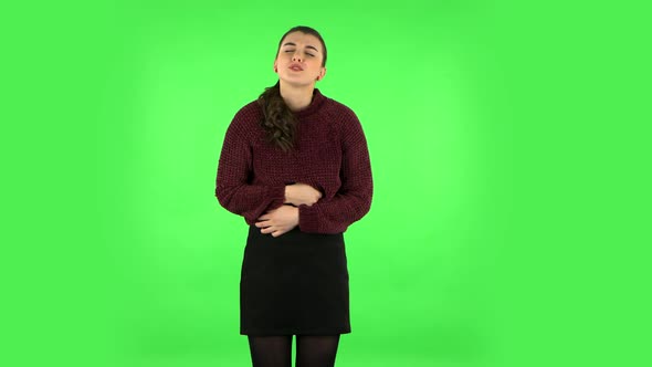 Cute Female Feels Very Bad, Her Stomach Hurts. Green Screen