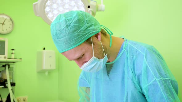 Portrait of Male Surgeon in a Operating Room at Hospital