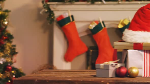 Wrapped gifts on wooden table