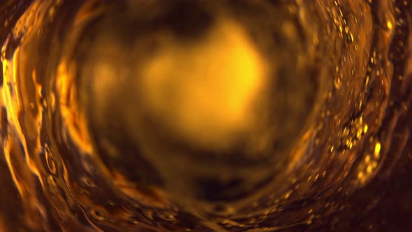 Super Slow Motion Shot of Ice Tea Vortex at 1000 Fps.