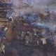 Aerial View of Burned Houses in Village, Firefighters Are Extinguishing Fire - VideoHive Item for Sale